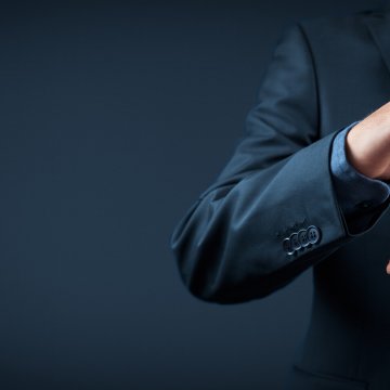 toco warranty benefits extended car warranty man in suit holding hologram toy car in hands